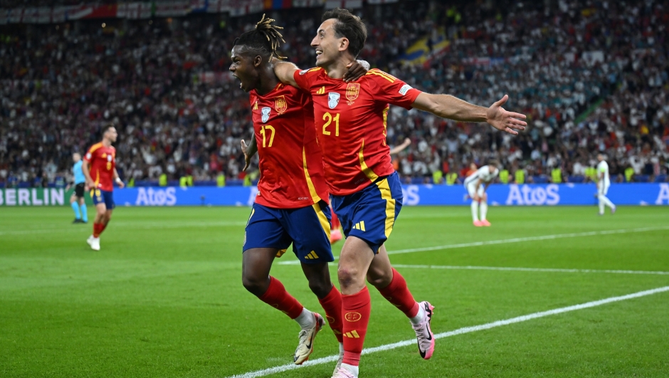 BERLIN, GERMANY - JULY 14: Mikel Oyarzabal of Spain celebrates scoring his team's second goal with teammate Nico Williams during the UEFA EURO 2024 final match between Spain and England at Olympiastadion on July 14, 2024 in Berlin, Germany. (Photo by Dan Mullan/Getty Images)