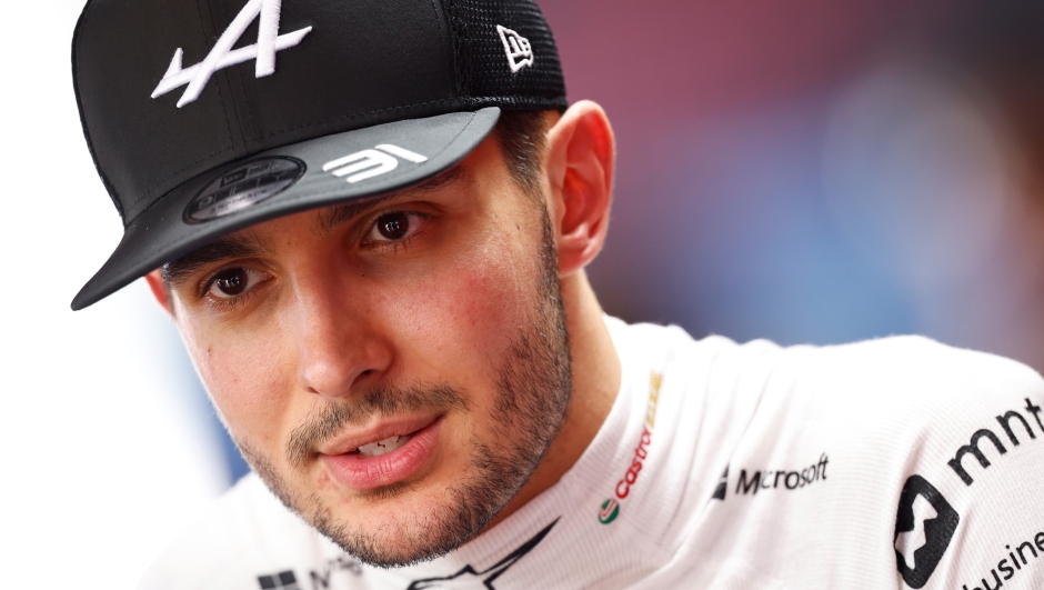 SPIELBERG, AUSTRIA - JUNE 29: 10th placed qualifier Esteban Ocon of France and Alpine F1 talks to the media in the Paddock after qualifying ahead of the F1 Grand Prix of Austria at Red Bull Ring on June 29, 2024 in Spielberg, Austria. (Photo by Chris Graythen/Getty Images)