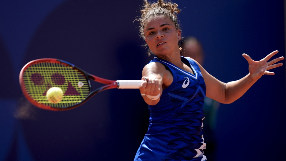 Jasmine Paolini of Italy returns the ball against Anna Karolina Schmiedlova of Slovakia during the men's single tennis competition at the Roland Garros stadium, at the 2024 Summer Olympics, Tuesday, July 30, 2024, in Paris, France. (AP Photo/Manu Fernandez)