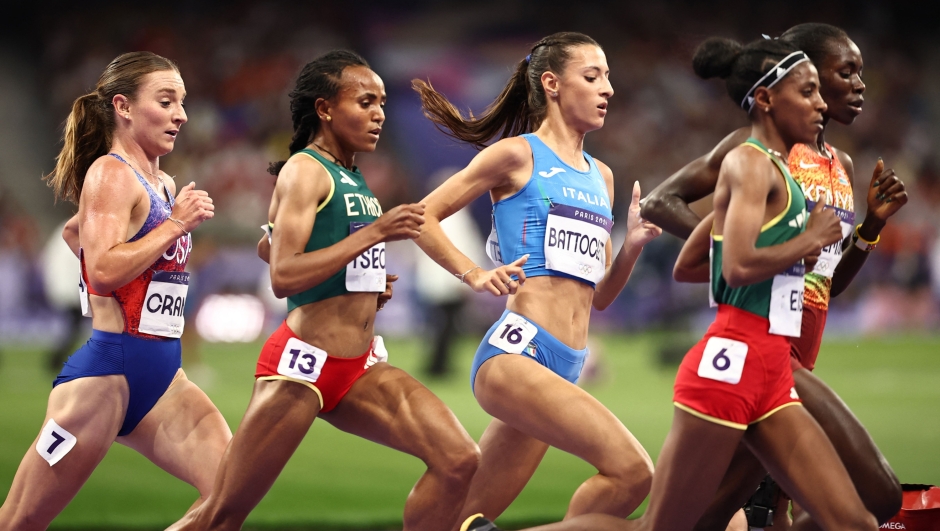 Italy's Nadia Battocletti (3R) competes in the women's 5000m final of the athletics event at the Paris 2024 Olympic Games at Stade de France in Saint-Denis, north of Paris, on August 5, 2024. (Photo by Anne-Christine POUJOULAT / AFP)