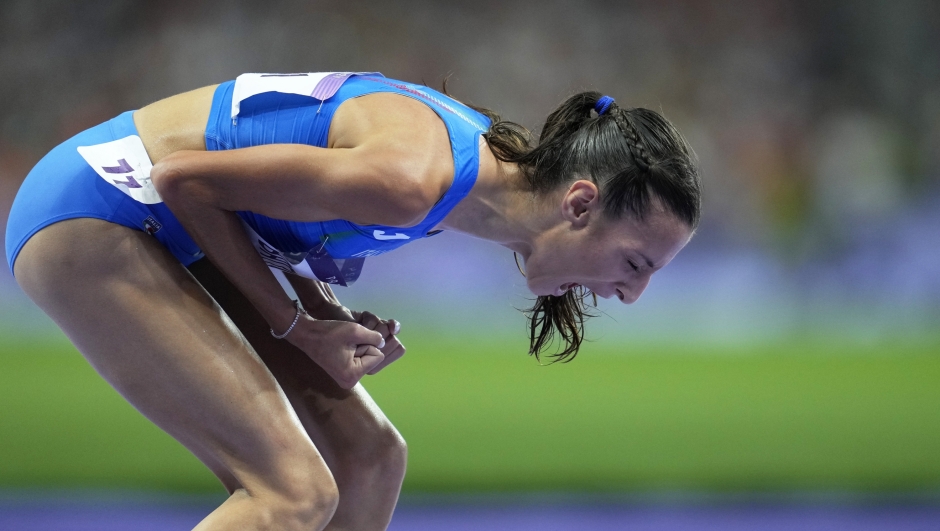 Nadia Battocletti, of Italy, reacts after winning the silver medal in the women's 10000 meters final at the 2024 Summer Olympics, Friday, Aug. 9, 2024, in Saint-Denis, France. (AP Photo/Ashley Landis)