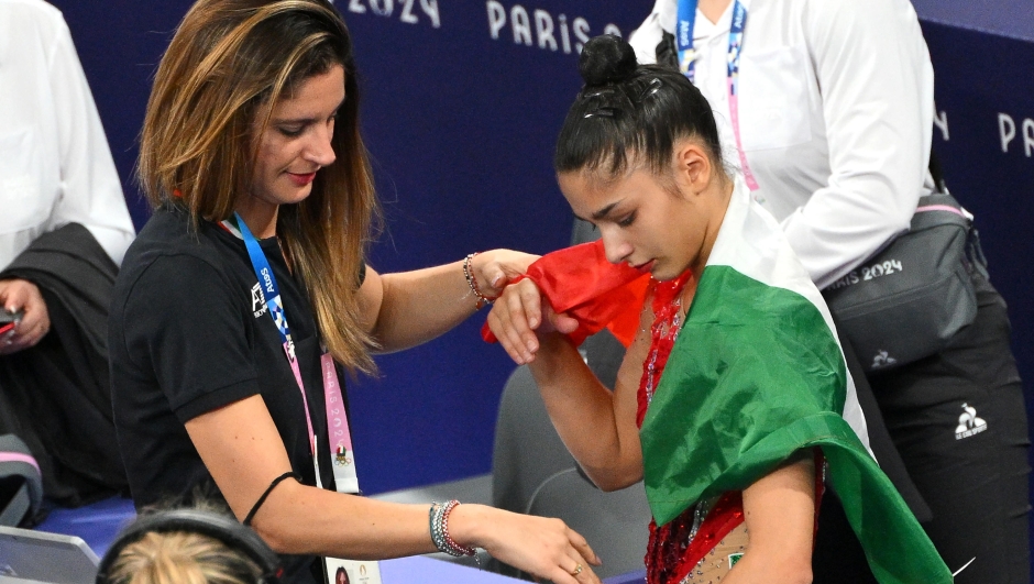 Italy's Sofia Raffaeli (R) and her coach Claudia Mancinelli celebrates after winning the bronze medal in the Individual All-Around final of the Rhythmic Gymnastics competitions in the Paris 2024 Olympic Games, at La Chapelle Arena in Paris, France, 9 August 2024. ANSA/ETTORE FERRARI