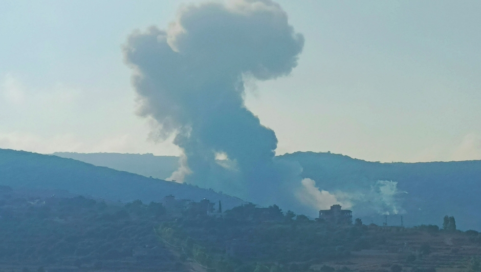 Smoke billows from an area targeted by an Israeli airstrike between the southern Lebanese border villages of Zibqin and Yater on August 25, 2024, amid escalations in the ongoing cross-border tensions as fighting continues between Israel and Hamas militants in the Gaza Strip. Hezbollah said early on August 25 it had launched more than 320 rockets at Israel overnight, targeting a string of military positions, even as Israel's military said it was carrying out pre-emptive strikes against the group. (Photo by Kawnat HAJU / AFP)