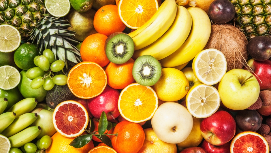 Fresh fruit background. Healthy eating and dieting concept. Winter assortment. Top view