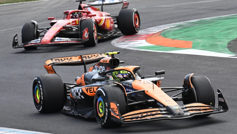 McLaren driver Lando Norris of Britain steers his car  ahead of Scuderia Ferrari driver Charles Leclerc of Monaco during the Formula One Grand Prix of Italy, Monza, Italy, 01 September 2024. ANSA/DANIEL DAL ZENNARO