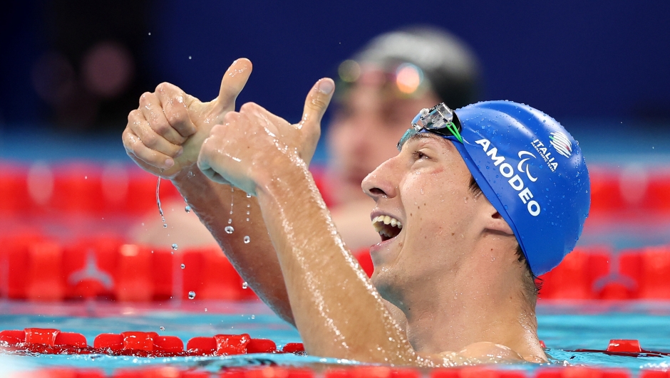 NANTERRE, FRANCE - SEPTEMBER 07: Alberto Amodeo of Team Italy reacts after winning gold during the Para Swimming Men's 100m Butterfly S8 Final on day ten of the Paris 2024 Summer Paralympic Games at Paris La Defense Arena on September 07, 2024 in Nanterre, France. (Photo by Sean M. Haffey/Getty Images)