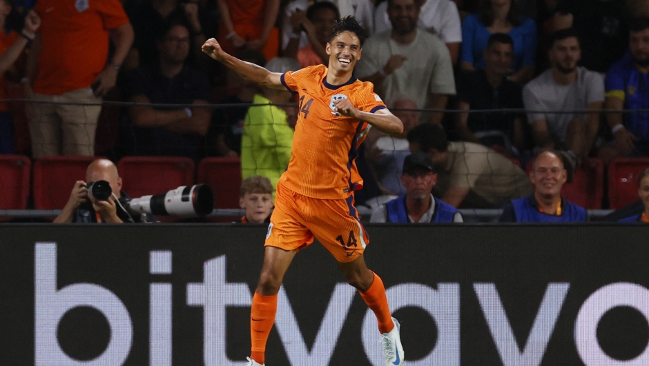 Netherlands' Tijjani Reijnders celebrates after scoring a goal during the UEFA Nations League Group 3 football match between Netherlands and Bosnia-Herzegovina at Philips Stadion in Eindhoven on September 7, 2024. (Photo by Pieter Stam de Jonge / ANP / AFP) / Netherlands OUT