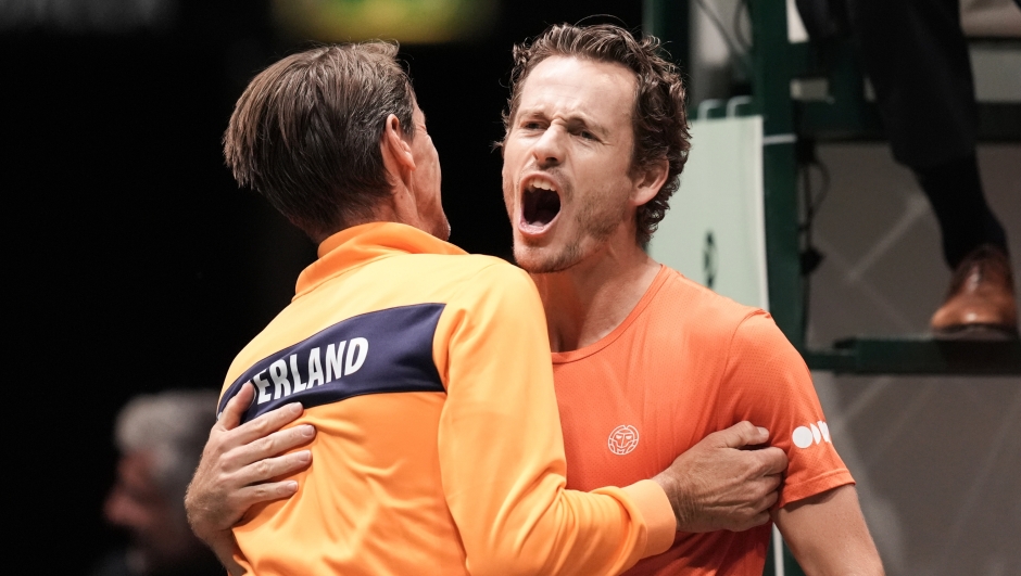 Wesley Koolhof celebrates with captain Paul Haarhuis for the victory during 2024 Davis Cup Finals Group A match between Wesley Koolhof/Botic van de Zandschulp (Netherlands) and Rafael Matos/Marcelo Melo (Brazil) at the Unipol Arena, Bologna, Italy -  September 12,  2024. Sport - Tennis. (Photo by Massimo Paolone/LaPresse)