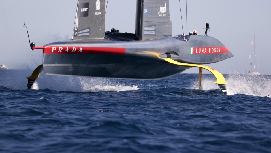 epa11605466 Italian vessel Luna Rossa competes during the second day of the the Louis Vuitton Cup Semi-Finals within the America's Cup sailing competition held in Barcelona, Spain, 15 September 2024.  EPA/Toni Albir