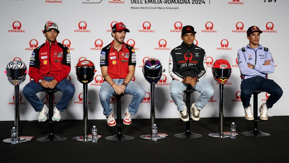 Enea Bastianini of Italy and Ducati Lenovo Team (L), Francesco Bagnaia of Italy and Ducati Lenovo Team (CL), Jorge Martin of Spain and Prima Pramac Racing (CR) and Marc Marquez of Spain and Gresini Racing MotoGP (R) during Presentation Press Conference of the Pramac MotoGP of Emilia Romagna at Marco Simoncelli Circuit on September 19 2024 in Misano Adriatico, Italy. ANSA/DANILO DI GIOVANNI