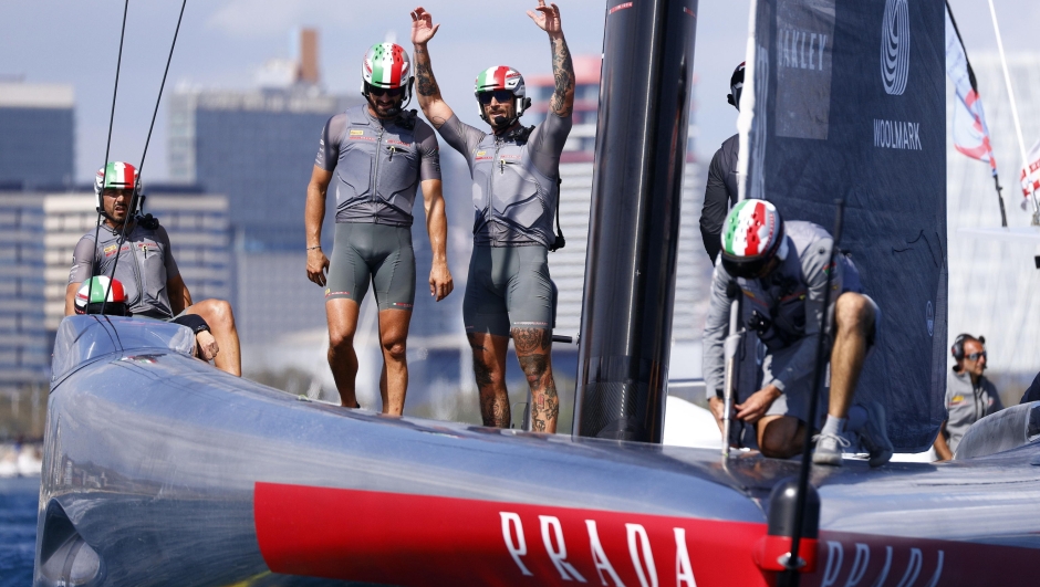 epa11613869 The crew of Luna Rossa Prada Pirelli celebrate after winning against NYYC American Magic on the last day of the Louis Vuitton Cup Semi-Finals within the America's Cup sailing competition, in Barcelona, Spain, 19 September 2024.  EPA/QUIQUE GARCIA