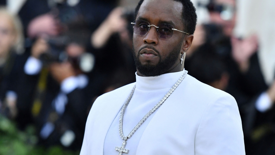 (FILES) Sean "Diddy" Combs arrives for the 2018 Met Gala on May 7, 2018, at the Metropolitan Museum of Art in New York. More than 100 alleged victims are to sue rapper Sean "Diddy" Combs and others for rape, sexual assault and sexual exploitation, a US lawyer announced on October 1, 2024. (Photo by Angela WEISS / AFP)