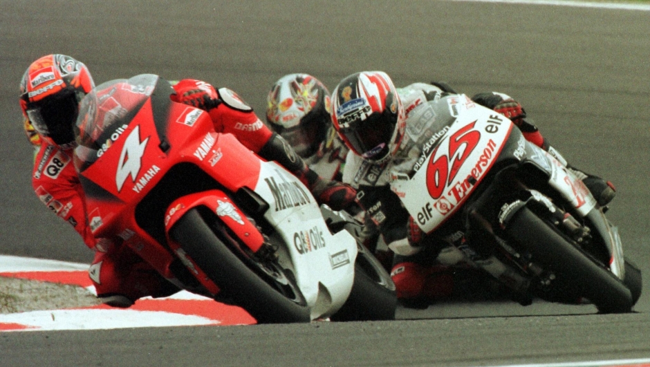 PIS18 - 20001029 - PHILLIP ISLAND, AUSTRALIA : Max Biaggi (L) of Italy on his Yamaha leads compatriots Loris Capirossi (R) and Valentino Rossi (C) on Hondas during the Australian 500cc Motorcycle Grand Prix on Phillip Island, 29 October 2000.  Biaggi won the final race of the 2000 season to finish the World Championship third overall. ANSA-CD       (FILM)  EPA PHOTO AFP/PAUL CROCK