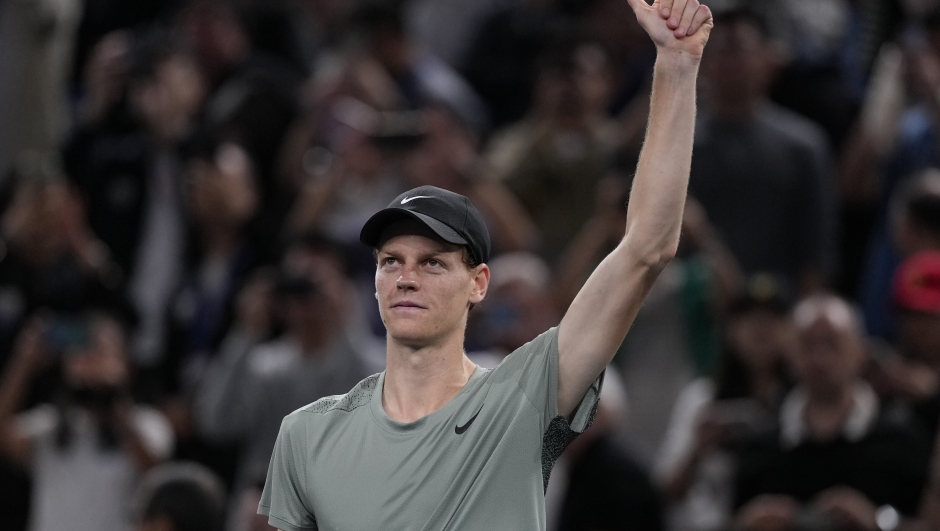 Jannik Sinner of Italy celebrates after defeating Novak Djokovic of Serbia during the men's singles finals match in the Shanghai Masters tennis tournament at Qizhong Forest Sports City Tennis Center in Shanghai, China, Sunday, Oct. 13, 2024. (AP Photo/Andy Wong)