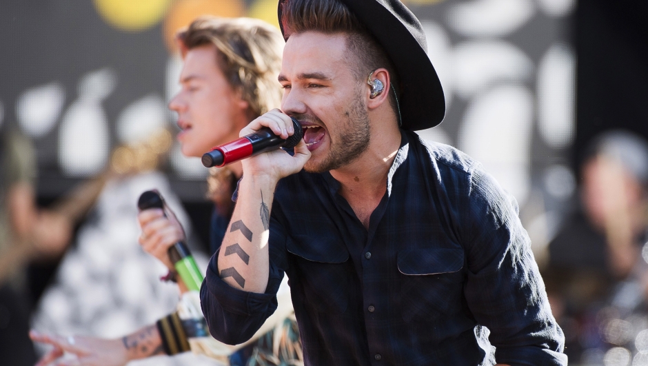 FILE - One Direction members, from right, Liam Payne and Harry Styles perform on ABC's "Good Morning America" at Rumsey Playfield/SummerStage on Tuesday, Aug. 4, 2015, in New York. (Photo by Charles Sykes/Invision/AP, File)