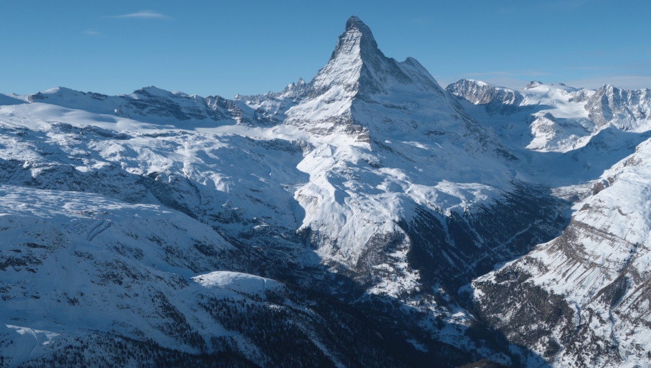 ZERMATT, SWITZERLAND - JANUARY 07: Matterhorn mountain looms above the valley that includes the village of Zermatt on January 7, 2022 near Zermatt, Switzerland. Zermatt is a popular tourist destination both in winter and summer.  (Photo by Sean Gallup/Getty Images)