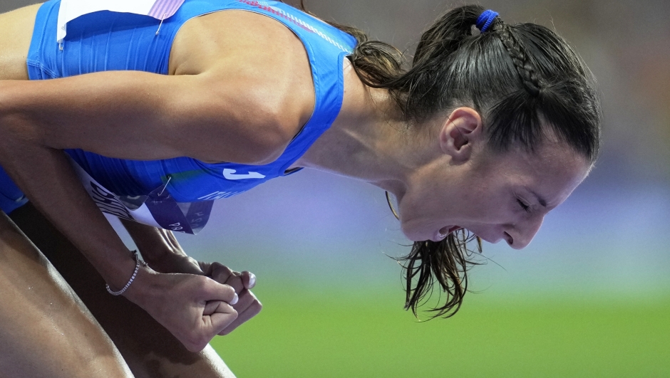 Nadia Battocletti, of Italy, reacts after winning the silver medal in the women's 10000 meters final at the 2024 Summer Olympics, Friday, Aug. 9, 2024, in Saint-Denis, France. (AP Photo/Ashley Landis)