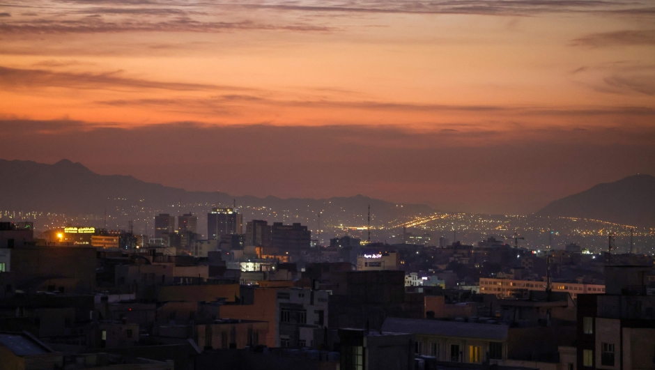 Part of the city skyline is pictured at dawn after several explosions were heard in Tehran on October 26, 2024. Israel announced the launch of "precise strikes" on military targets in Iran on October 26 in retaliation for Iranian attacks, as an AFP journalist in Tehran reported hearing several explosions. (Photo by ATTA KENARE / AFP) / The erroneous mention[s] appearing in the metadata of this photo by - has been modified in AFP systems in the following manner: [October 26] instead of [October 24]. Please immediately remove the erroneous mention[s] from all your online services and delete it (them) from your servers. If you have been authorized by AFP to distribute it (them) to third parties, please ensure that the same actions are carried out by them. Failure to promptly comply with these instructions will entail liability on your part for any continued or post notification usage. Therefore we thank you very much for all your attention and prompt action. We are sorry for the inconvenience this notification may cause and remain at your disposal for any further information you may require.