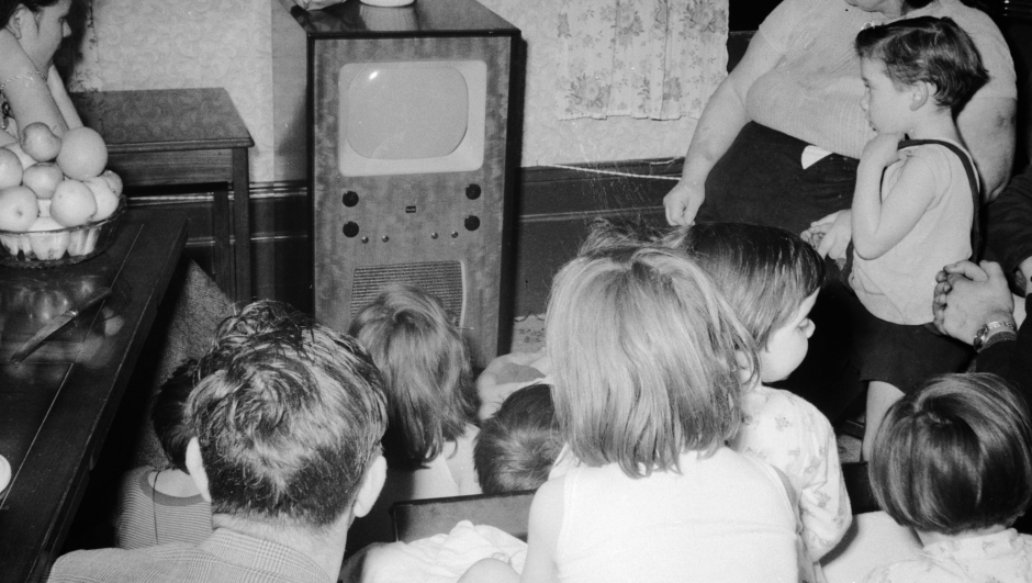 circa 1955:  Watching TV is cheaper for the Hudson's with their large family than going to the pictures.  (Photo by Evans/Three Lions/Getty Images)