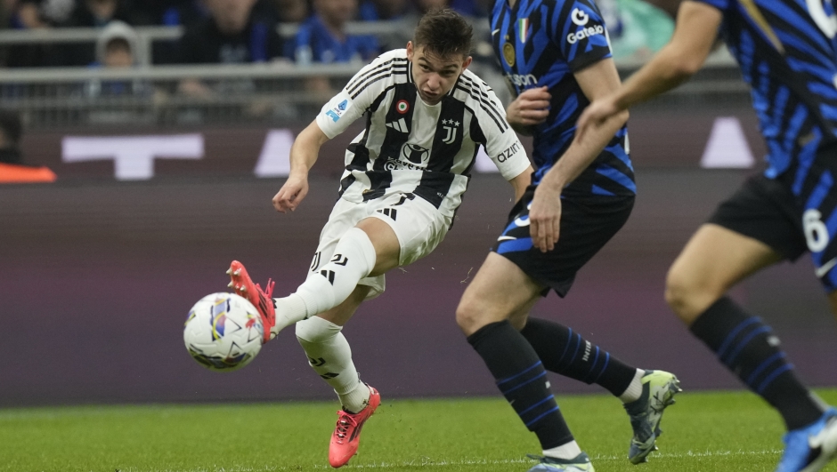 Juventus' Francisco Conceicao is in action during a Serie A soccer match between Inter Milan and Juventus at the San Siro stadium in Milan, Italy, Sunday, Oct. 27, 2024. (AP Photo/Luca Bruno)