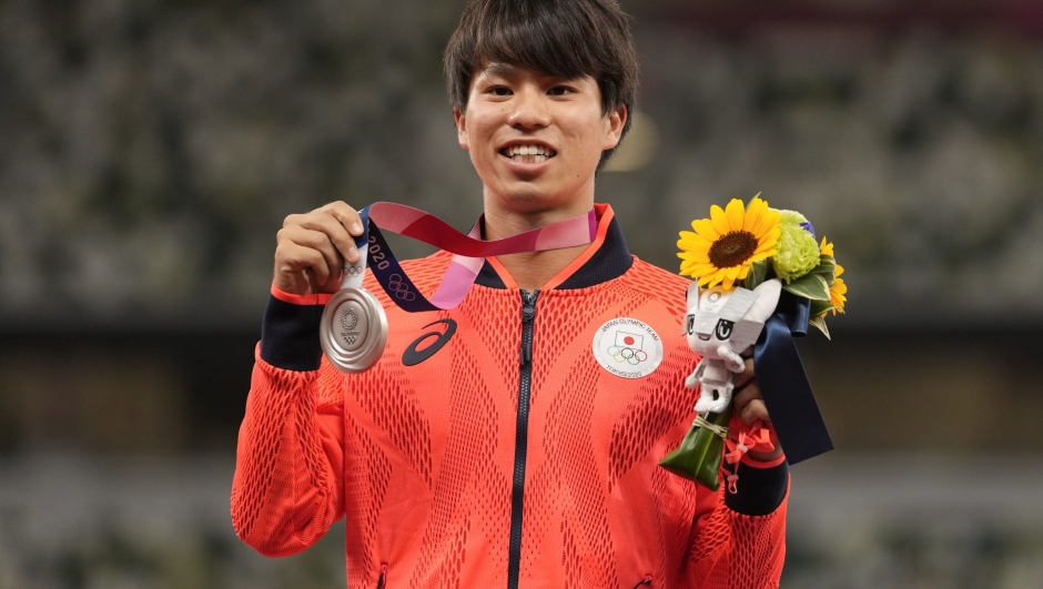 FILE - Silver medalist Koki Ikeda, of Japan, poses during the medal ceremony for the men's 20km race walk at the 2020 Summer Olympics, Aug. 6, 2021, in Tokyo. (AP Photo/Martin Meissner, File)