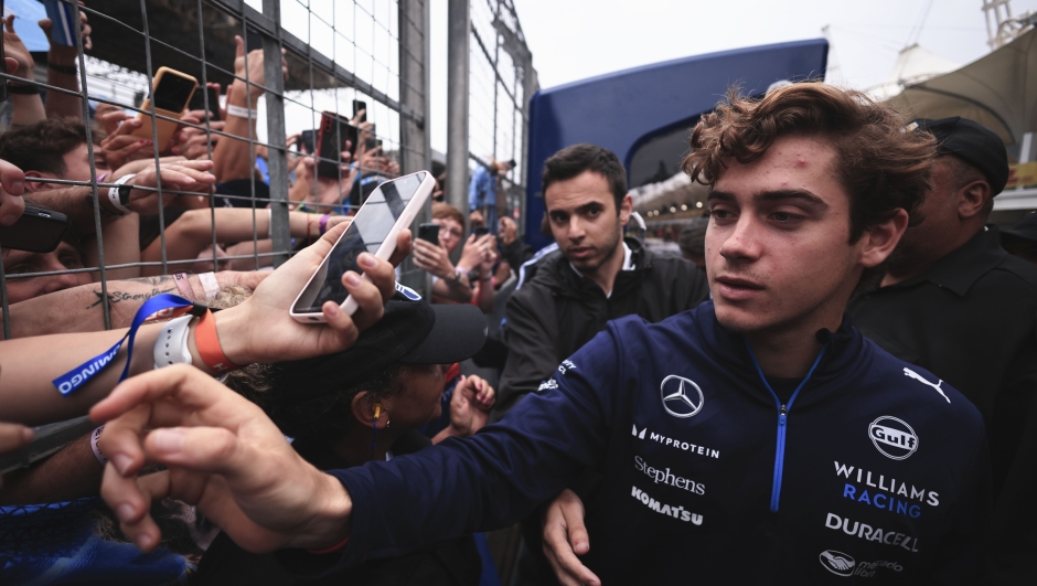 Williams driver Franco Colapinto of Argentina, greets fans at the end of the Brazilian Formula One Grand Prix at the Interlagos race track, in Sao Paulo, Brazil, Sunday, Nov. 3, 2024. (AP Photo/Ettore Chiereguini)