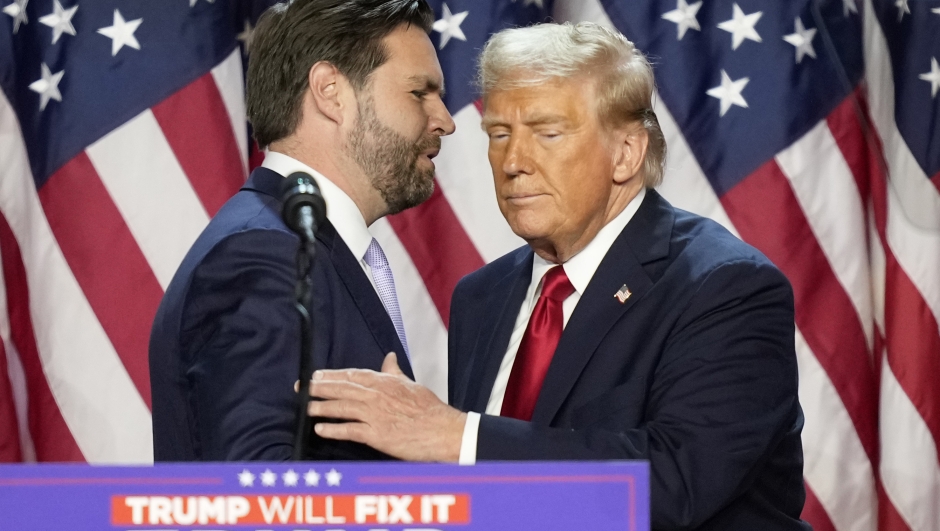 Republican vice presidential nominee Sen. JD Vance, R-Ohio, left, hugs Republican presidential nominee former President Donald Trump at an election night watch party, Wednesday, Nov. 6, 2024, in West Palm Beach, Fla. (AP Photo/Alex Brandon)    Associated Press / LaPresse Only italy and Spain