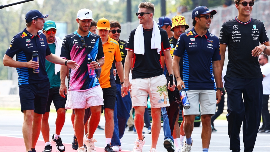 MONZA, ITALY - SEPTEMBER 01: Max Verstappen of the Netherlands and Oracle Red Bull Racing, Pierre Gasly of France and Alpine F1, and Nico Hulkenberg of Germany and Haas F1 talk on the drivers parade prior to the F1 Grand Prix of Italy at Autodromo Nazionale Monza on September 01, 2024 in Monza, Italy. (Photo by Clive Rose/Getty Images)