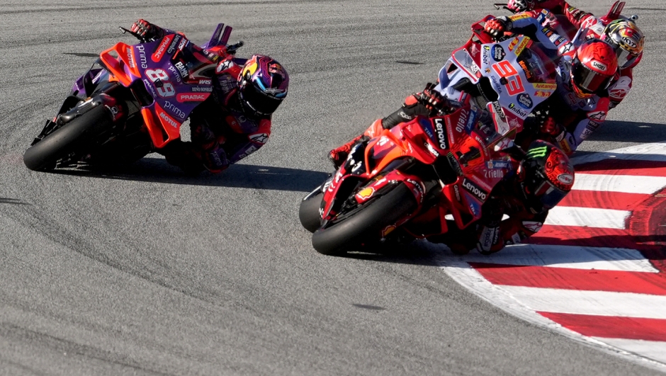 Ducati Italian rider Francesco Bagnaia (R) followed by Ducati Spanish rider Marc Marquez and Ducati Spanish rider Jorge Martin (L) compete during the MotoGP Solidarity Grand Prix of Barcelona at the Circuit de Catalunya on November 17, 2024 in Montmelo on the outskirts of Barcelona. (Photo by Manaure Quintero / AFP)