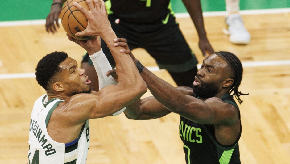 epa11761382 Milwaukee Bucks forward Giannis Antetokounmpo (L) is fouled by Boston Celtics guard Jaylen Brown (R) during the NBA game between the Boston Celtics and the Milwaukee Bucks in Boston, Massachusetts, USA, 06 December 2024.  EPA/CJ GUNTHER  SHUTTERSTOCK OUT