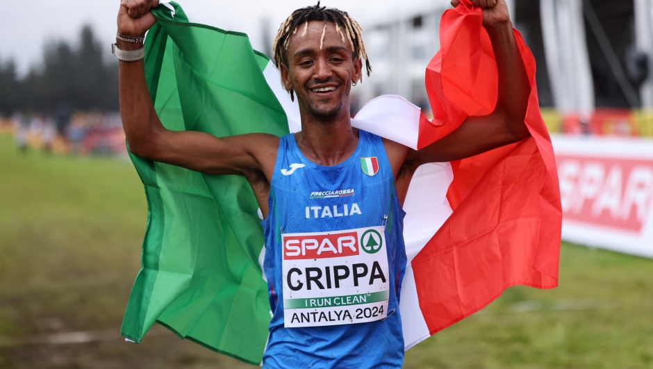 ANTALYA, TURKEY - DECEMBER 08: Yemaneberhan Crippa of Team Italy celebrates wining silver in the Men's Senior cross country race during the 30th SPAR European Cross Country Championships on December 08, 2024 in Antalya, Turkey. (Photo by Maja Hitij/Getty Images for European Athletics)