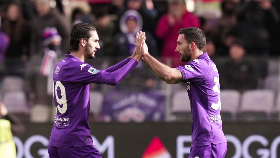 Fiorentina's Danilo Cataldi celebrates with Fiorentina's Yacine Adli after scoring the 1-0 goal for his team during the Serie A Enilive 2024/2025 match between Fiorentina and Cagliari - Serie A Enilive at Artemio Franchi Stadium - Sport, Soccer - Florence, Italy - Sunday December 8, 2024 (Photo by Massimo Paolone/LaPresse)