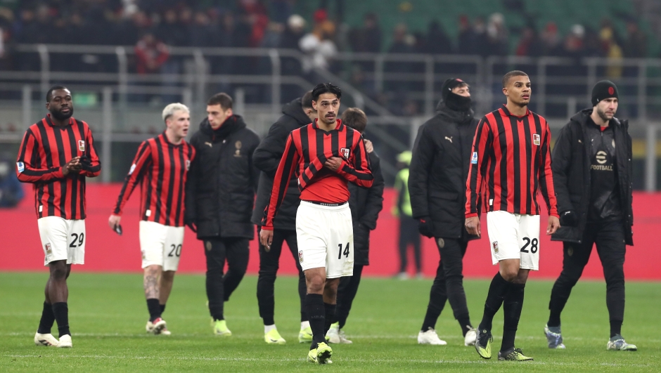 MILAN, ITALY - DECEMBER 15: Players of AC Milan react after the Serie A match between AC Milan and Genoa at Stadio Giuseppe Meazza on December 15, 2024 in Milan, Italy. (Photo by Marco Luzzani/Getty Images)