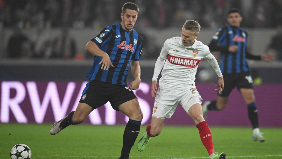 Atalanta's Italian defender #27 Marco Palestra and Stuttgart's French midfielder #08 Enzo Millot vie for the ball during the UEFA Champions League football match  VfB Stuttgart vs Atalanta BC in Stuttgart, southwestern Germany on November 6, 2024. (Photo by THOMAS KIENZLE / AFP)