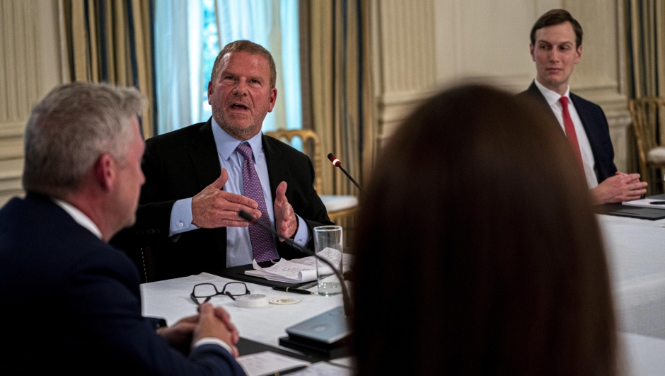 epa08431058 Tilman Fertitta is the owner of the Houston Rockets makes remarks towards US President Donald J. Trump as he participates in a roundtable with Restaurant Executives and Industry Leaders in the State Dining Room, in the White House, Washington, DC, USA, 18 May 2020.  EPA/Doug Mills / POOL