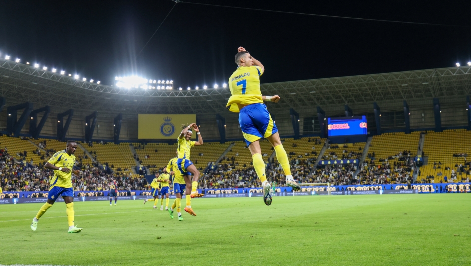 RIYADH, SAUDI ARABIA - NOVEMBER 29: Cristiano Ronaldo? of Al-Nassr FC celebrates scoring their first goal  during the Saudi Pro League match between Al-Nassr and Damac at Al Awwal Park on November 29, 2024 in Riyadh, Saudi Arabia. (Photo by Abdullah Ahmed/Getty Images)