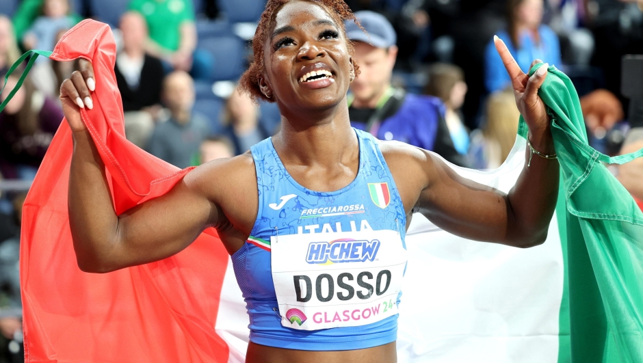 epa11195348 Zaynab Dosso of Italy celebrates after placing third in the Women's 60m final at the World Athletics Indoor Championships in Glasgow, Britain, 02 March 2024.  EPA/ROBERT PERRY