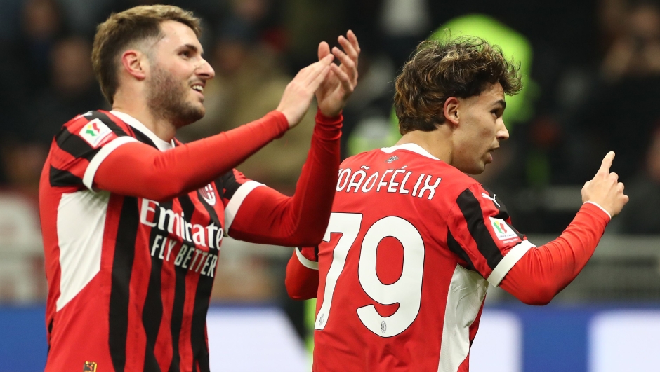  Joao Felix of AC Milan celebrates with his team-mate Santiago Gimenez after scoring his team's third goal during the Coppa Italia, Quarter Final match between AC Milan and AS Roma at Stadio Giuseppe Meazza on February 05, 2025 in Milan, Italy. (Photo by Marco Luzzani/Getty Images)