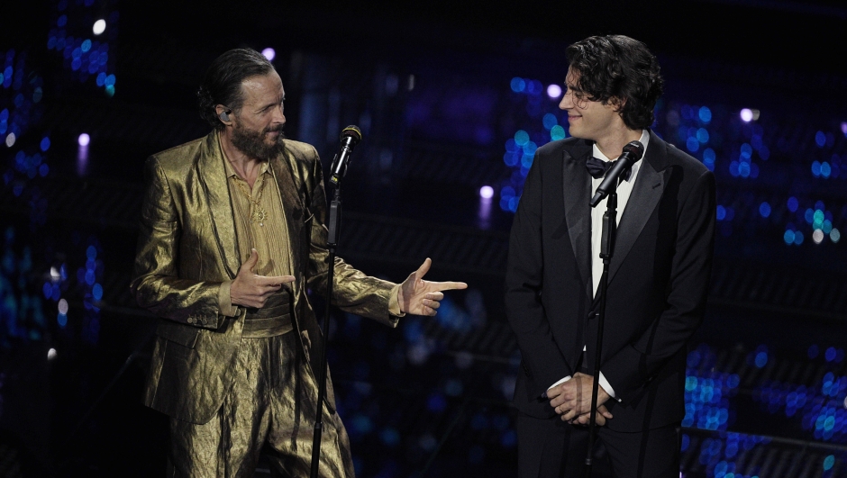 Jovanotti and Gianmarco Tamberi during the first evening of 75th edition of the Sanremo Italian Song Festival at the Ariston Theatre in Sanremo, northern Italy - Tuesday, February 11, 2025. Entertainment. (Photo by Marco Alpozzi/LaPresse)