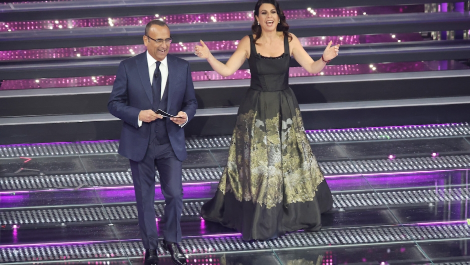 Pagelle Sanremo 2025 quarta serata cover duetti