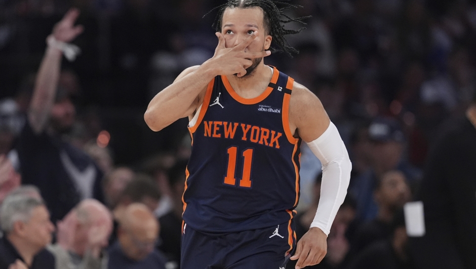 New York Knicks' Jalen Brunson (11) gestures after making a three-point shot during the second half of Game 4 in the Eastern Conference semifinals of the NBA basketball playoffs against the Boston Celtics Monday, May 12, 2025, in New York. (AP Photo/Frank Franklin II)