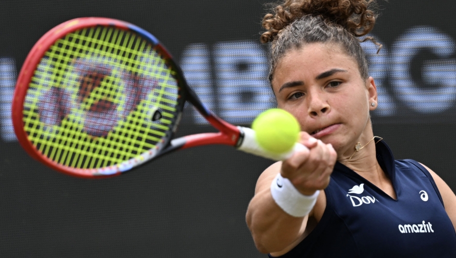 Italy's Jasmine Paolini returns the ball to Poland's Iga Swiatek (unseen) during their semi-final match of the 2025 WTA Bad Homburg Open Tennis Tournament on June 27, 2025 in Bad Homburg, western Germany. (Photo by Kirill KUDRYAVTSEV / AFP)