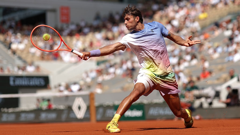 Flavio Cobolli of Italy plays a backhand against Alexander Zverev of Germany during the Men's Singles Third Round match on Day Seven of the 2025 French Open at Roland Garros on May 31, 2025 in Paris, France. (Photo by Adam Pretty/Getty Images)