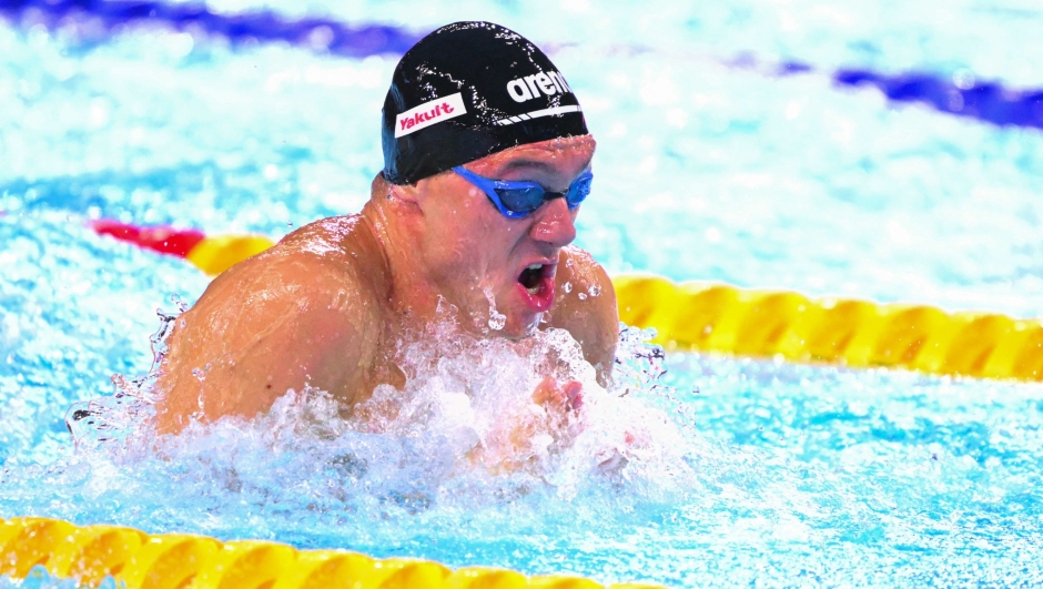 Italy's swimmer Simone Cerasuolo competes in a semi-final of the men's 50m breaststroke swimming event during the 2025 World Aquatics Championships in Singapore on July 29, 2025. (Photo by François-Xavier MARIT / AFP)