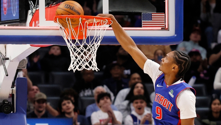 Detroit Pistons guard Ausar Thompson (9) dunks the ball against the Denver Nuggets during the second half of an NBA basketball game Tuesday, Feb. 3, 2026, in Detroit. (AP Photo/Duane Burleson)
