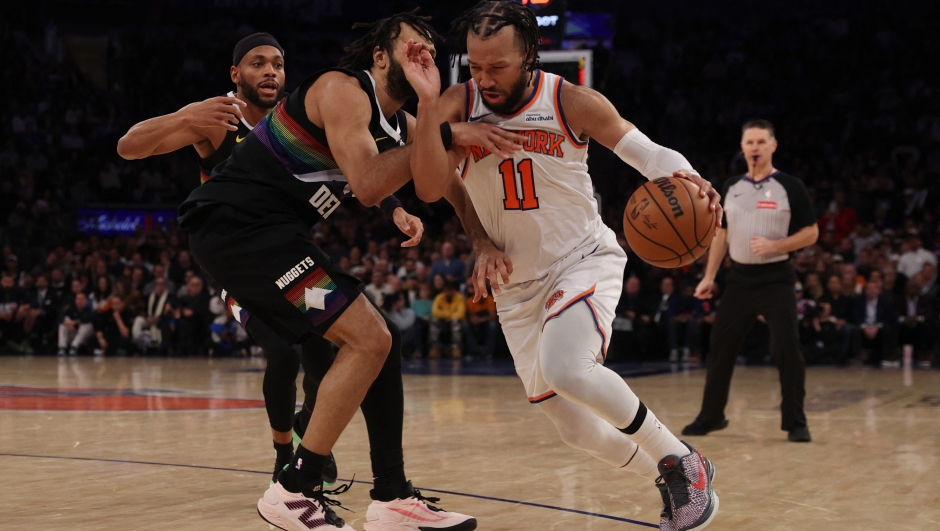 Jalen Brunson #11 of the New York Knicks drives to the basket against Jamal Murray #27 of the Denver Nuggets during the second overtime period at Madison Square Garden on February 04, 2026 in New York City. NOTE TO USER: User expressly acknowledges and agrees that, by downloading and or using this photograph, User is consenting to the terms and conditions of the Getty Images License Agreement.   Pamela Smith/Getty Images/AFP (Photo by Pamela Smith / GETTY IMAGES NORTH AMERICA / Getty Images via AFP)