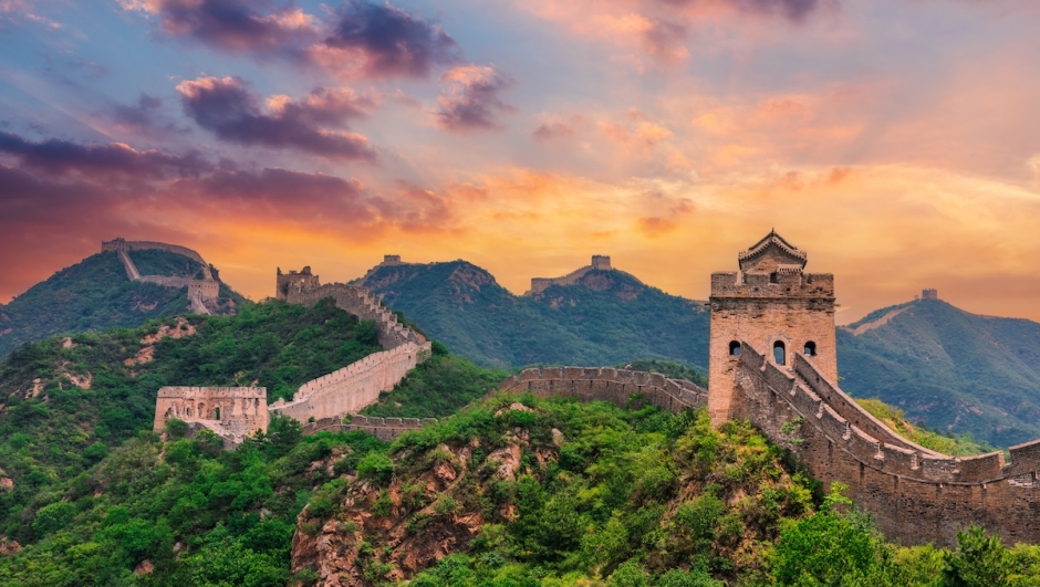 The great wall of china under the colorful sky during sunset