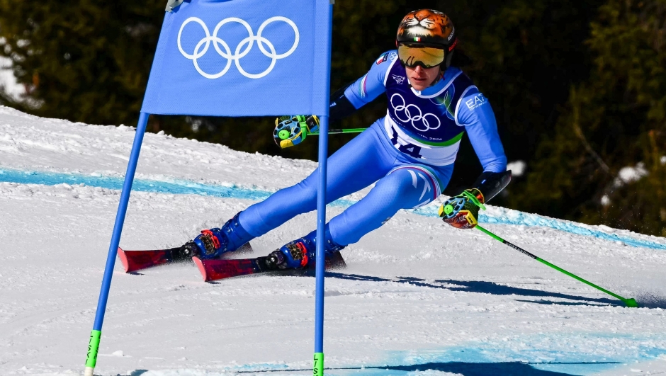 Italy's Federica Brignone competes in the first run of the women's giant slalom event during the Milano Cortina 2026 Winter Olympic Games at the Tofane Alpine Skiing Centre in Cortina dAmpezzo on February 15, 2026. (Photo by Stefano RELLANDINI / AFP)
