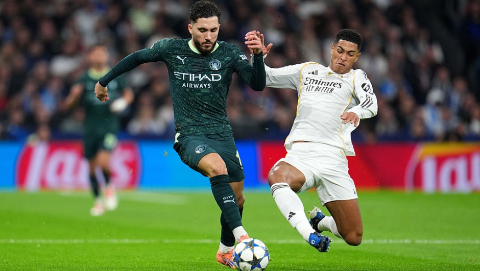  Rayan Cherki of Manchester City is challenged by Jude Bellingham of Real Madrid during the UEFA Champions League 2025/26 League Phase MD6 match between Real Madrid C.F. and Manchester City at Estadio Santiago Bernabeu on December 10, 2025 in Madrid, Spain. (Photo by Aitor Alcalde/Getty Images)