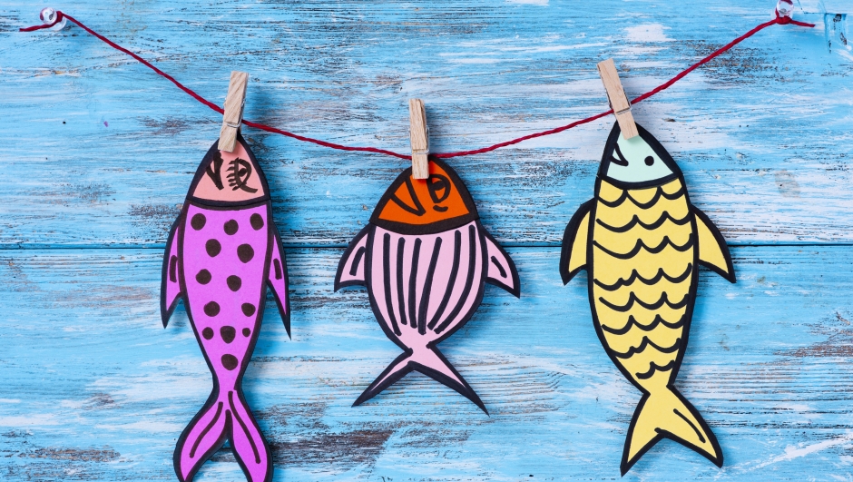 some homemade paper fishes, made by myself, as a popular prank for april fools day in countries such as Italy, France, Belgium, Netherlands, Switzerland or Canada hanging from a rope with clothespins